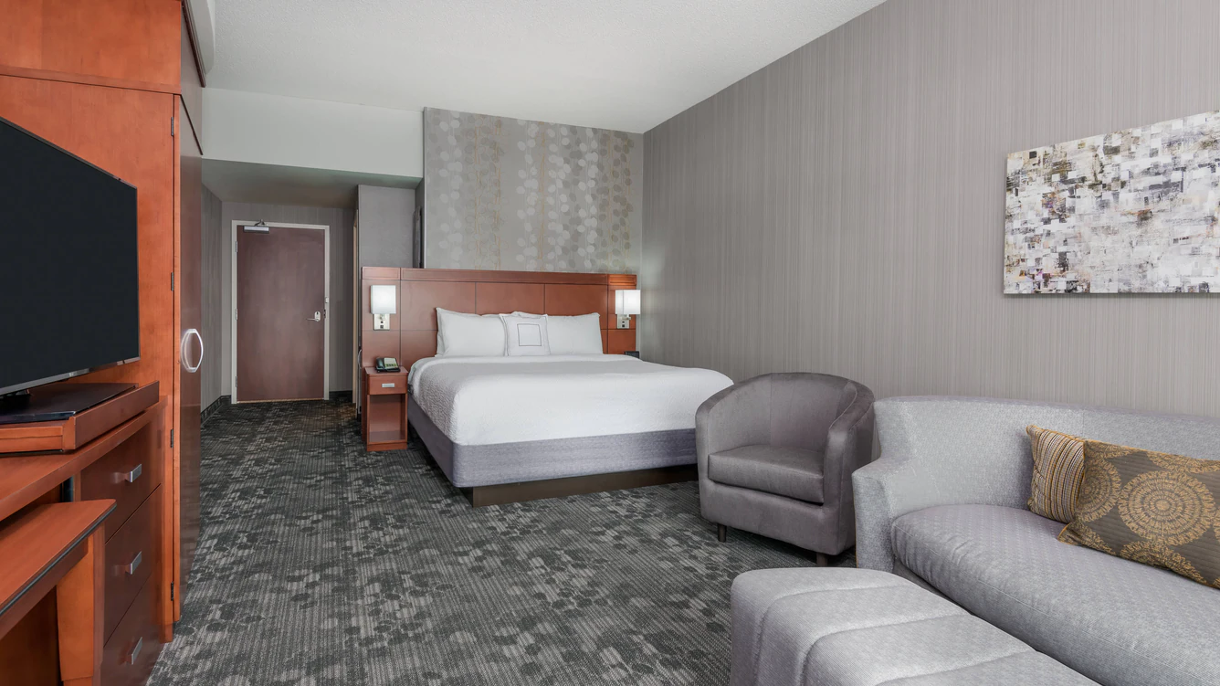 Find cheep and luxury cars at Buffalo Niagara International Airport  to Courtyard by Marriott Buffalo Airport